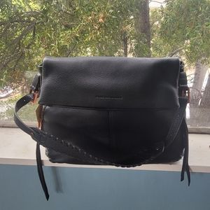 Black leather purse with grey fabric lining